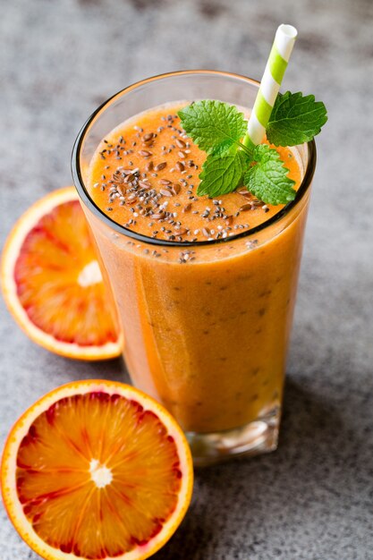 Smoothie, Red Orange, decor mint leaves.