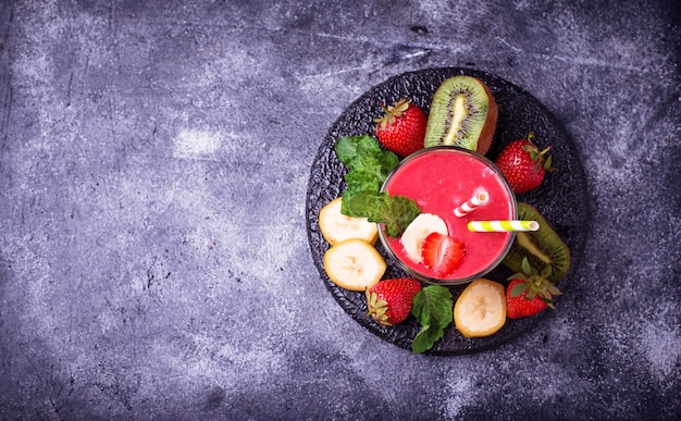 Smoothie with strawberry, banana and kiwi 