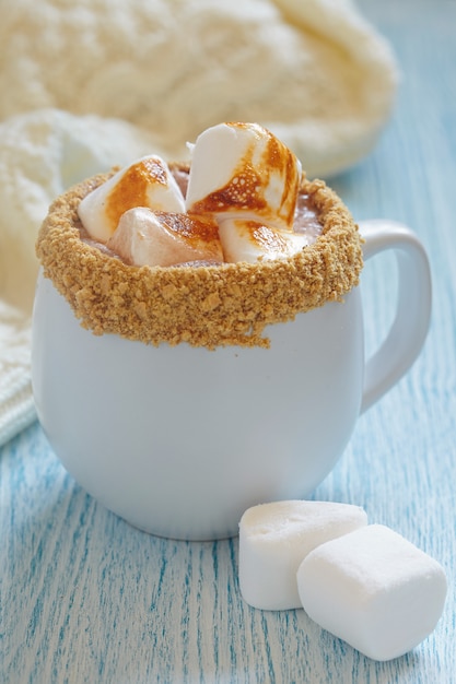 Smores hot chocolate with roasted marshmallo and graham cracker