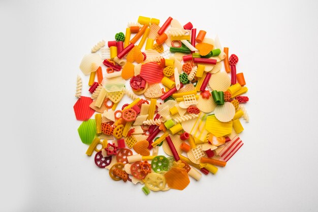 Snack pellets are non-expanded products made with raw materials like cereals, potatoes or vegetable powders, later processed using frying, hot air baking. multicoloured or shaped ready-to-eat snacks