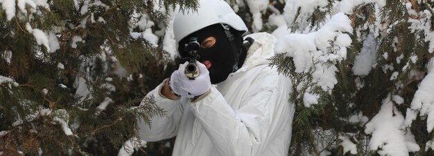 sniper with a gun in winter