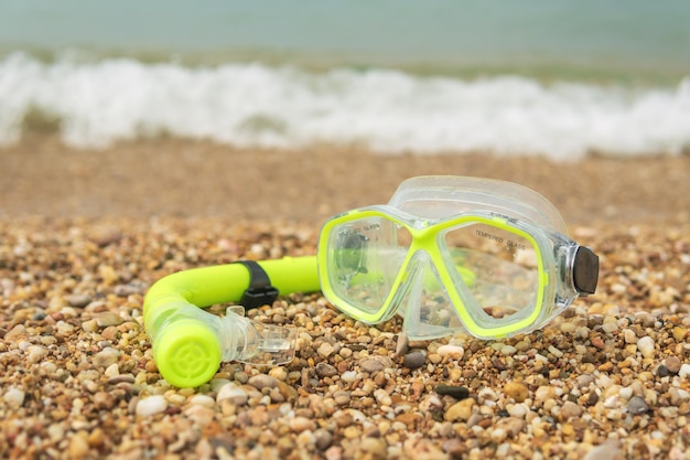 Snorkeling mask on a beach