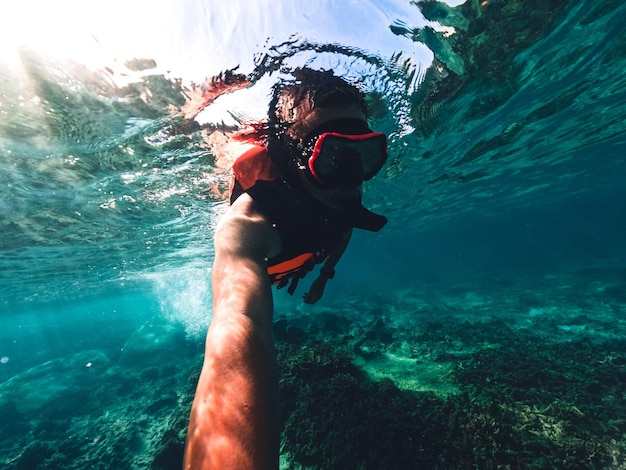 Snorkeling in the sea on a tropical island