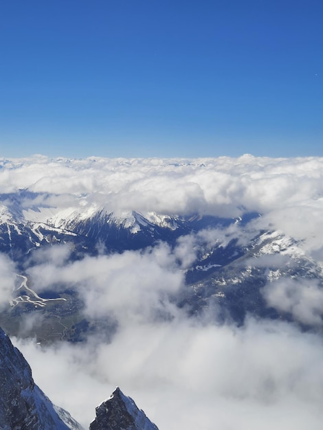 Snow covered mountain top in austria view of the alps from the zugspitze the highest mountain in