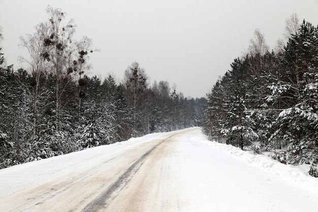 Snow-covered road in the winter season, Close-up photo