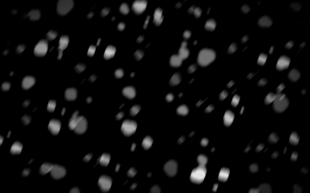 Snow flakes on a dark background Snowfall at night