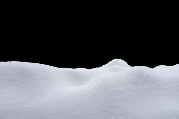 Snow isolated on a black background. winter design element. High quality photo