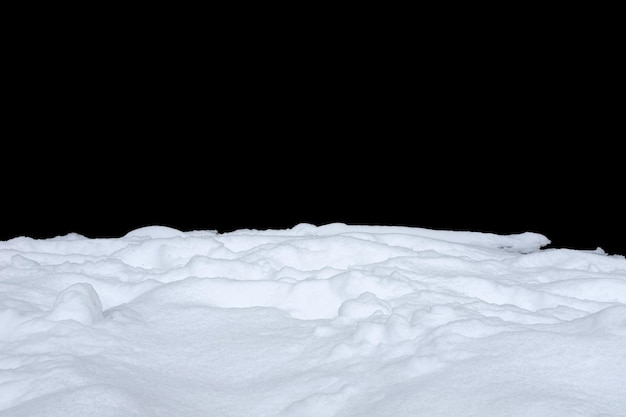 Snow isolated on a black background. winter design element. High quality photo