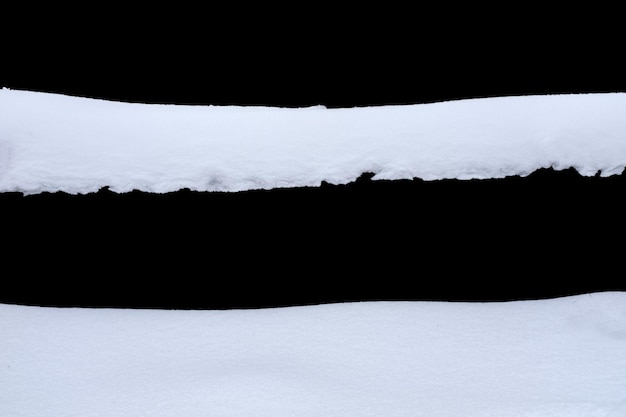 Snow isolated on a black background. winter design element. High quality photo