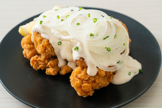 Snow Onion Chicken or Fried Chicken with Creamy Onions Sauce with Lemon in Korean style - Korean food style