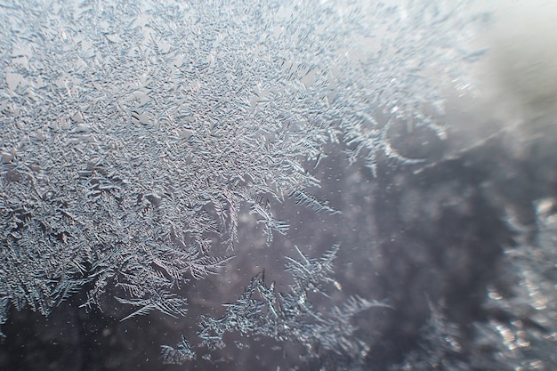 Photo snow pattern on the glass from frost