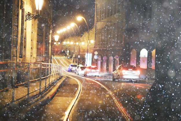 snow transport road city / landscape in a night city in winter, cars on the road in traffic jam in cold weather, snow