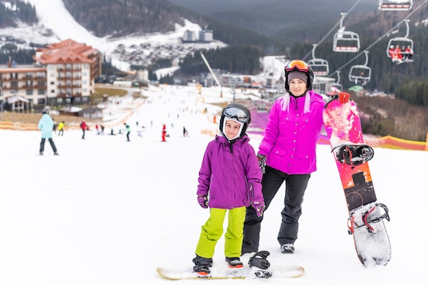 snowboard lesson in winter resort