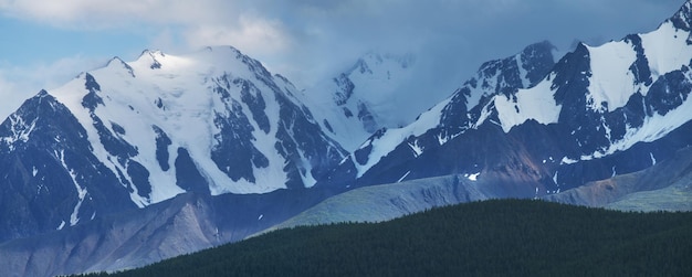 Snowcapped mountain peaks hiking in the mountains