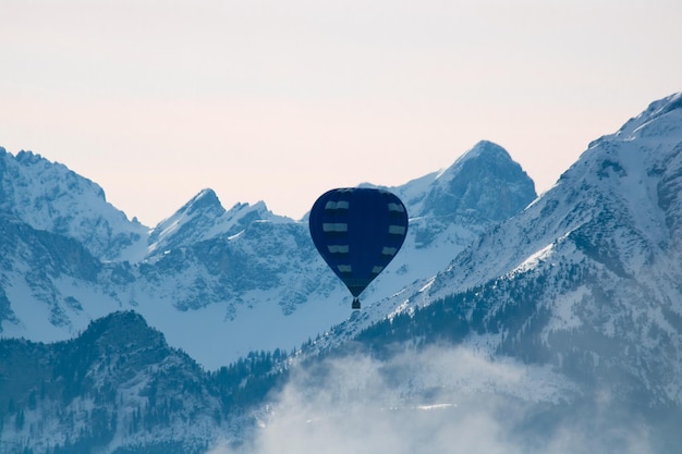 Snowcapped mountains against clear sky