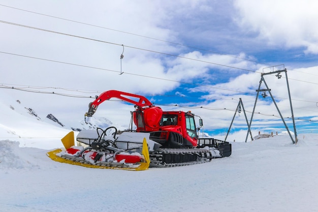 Snowcat machine for snow removal preparation ski trails snow groomer