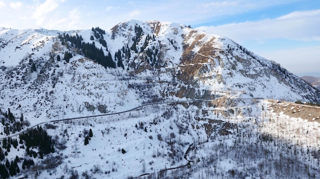 Snowcovered mountain with a highway