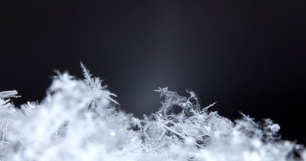 Snowflake On Natural Snowdrift Close Up  Christmas And Winter Background