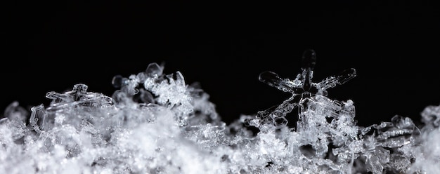 Snowflake On Natural Snowdrift Close Up  Christmas And Winter Background