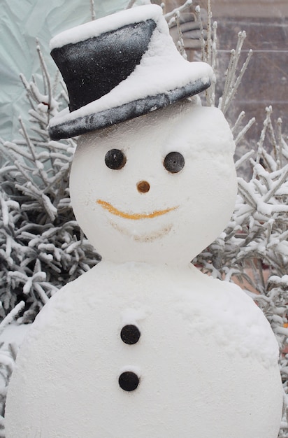 Photo snowman with hat