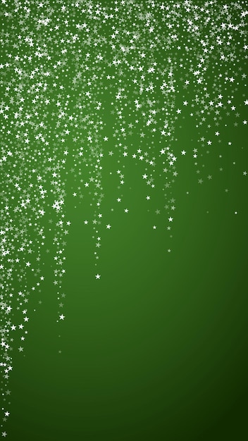 Photo snowy christmas background subtle flying snow flakes and stars on christmas green background delicate sweet snowy christmas vertical vector illustration