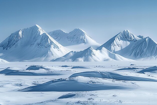 Photo a snowy landscape with mountains in the background