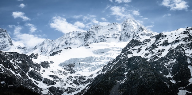 snowy mountains peaks and glacier on a sunny dayshot aoraki mount cook national park new zealand