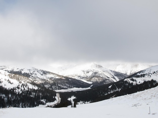 Snowy winter scene high in the mountain. Colorado Rocky Mountains USA.