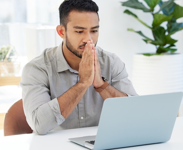 So how we gonna solve this problem Shot of a young man using his laptop at work in a modern office