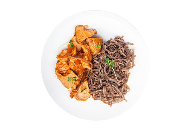 Soba buckwheat noodles meat tomato sauce meal food snack on the table copy space