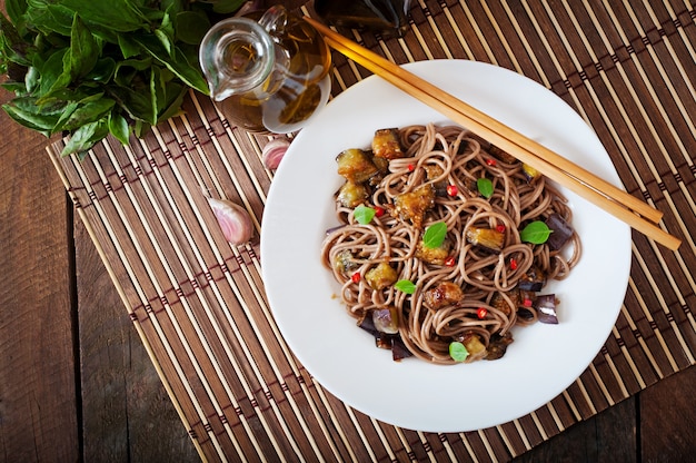 Soba noodles with eggplant in sweet and sour sauce