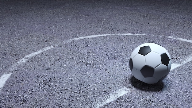 Soccer ball on asphalt