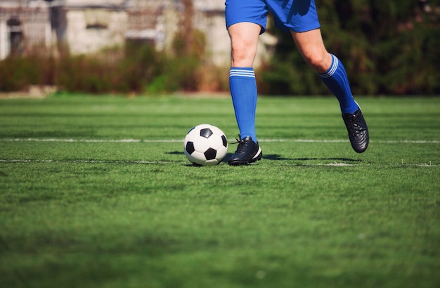 Soccer ball on green playground. Soccer concept