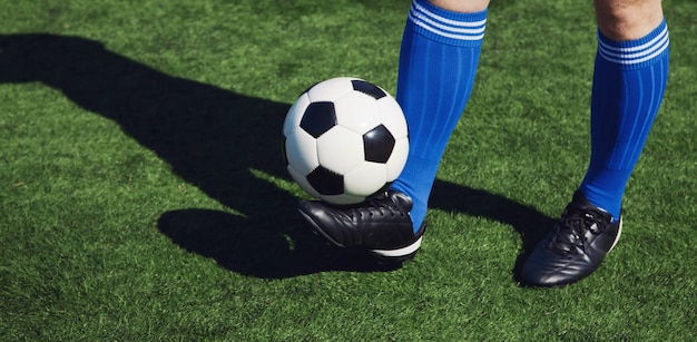 Soccer ball on green playground. Soccer concept