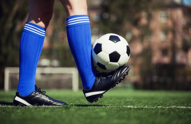 Soccer ball on green playground Soccer concept