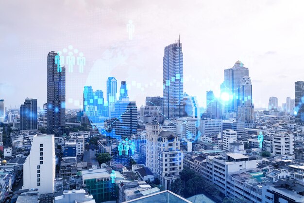 Social media icons hologram over panorama city view of Bangkok Asia The concept of people networking and connections Double exposure