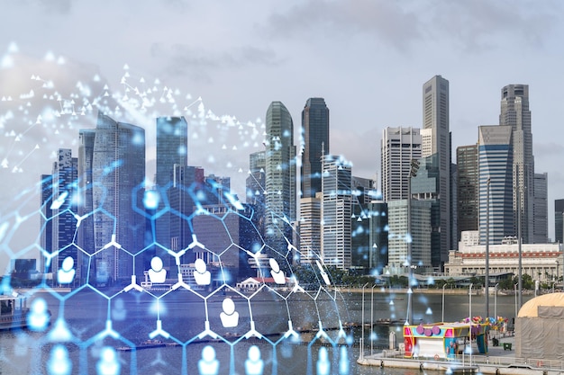 Social media icons hologram over panorama city view of Singapore Asia The concept of people networking connections and career opportunities Double exposure