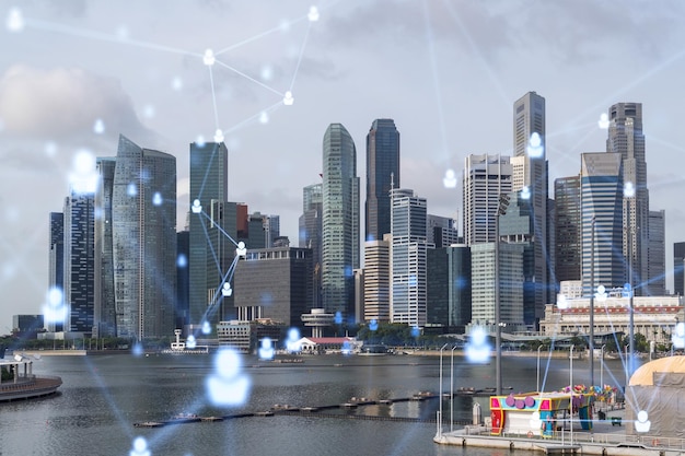 Social media icons hologram over panorama city view of Singapore Asia The concept of people networking connections and career opportunities Double exposure