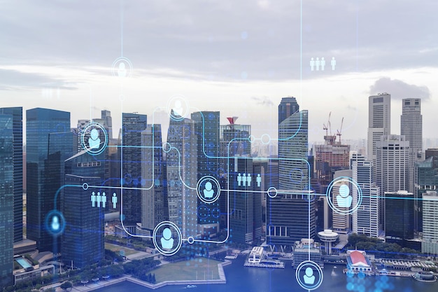 Social media icons hologram over panorama city view of Singapore Asia The concept of people networking connections and career opportunities Double exposure