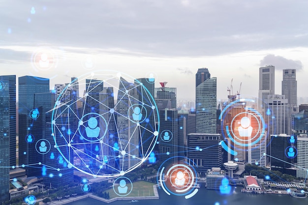 Social media icons hologram over panorama city view of Singapore Asia The concept of people networking connections and career opportunities Double exposure