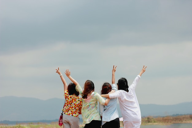 Soft and blur focus with Happy woman friends having fun and expressing emotions look at the moutain