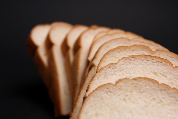 Soft bread with a black background.