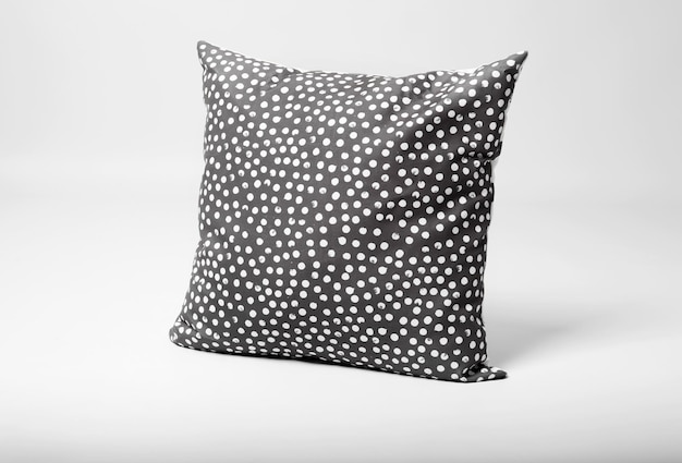 Soft decorative pillow on light background