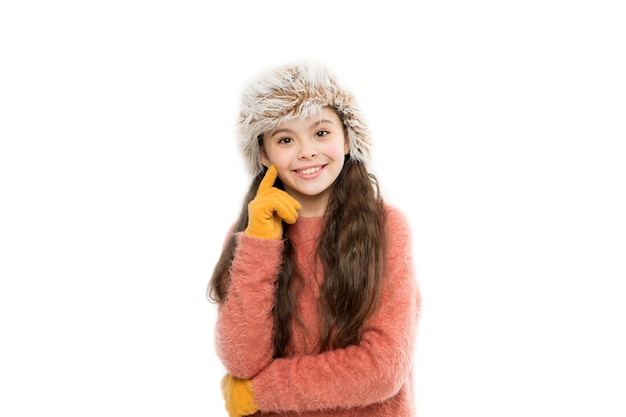 Soft feelings Playful fashionista Child long hair soft fur hat enjoy softness Soft care concept Faux fur trend Girl long hair wear fur hat white background Softener for woolen garments