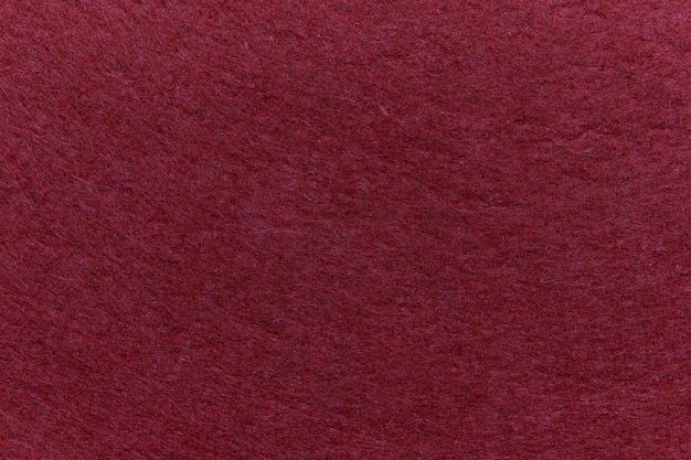 Soft felt textile material red pink colors colorful texture flap fabric background closeup