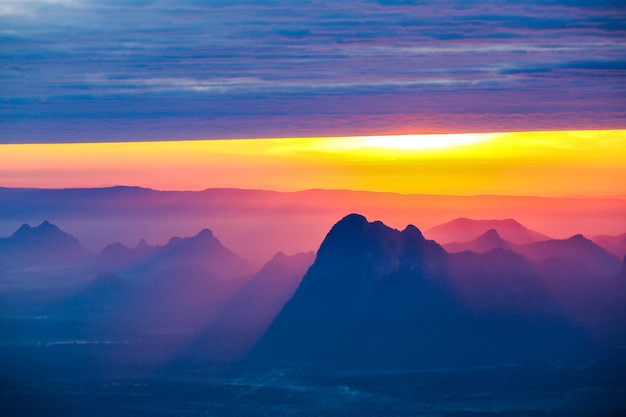 Soft focus and blur Beautiful landscape on the top of mountains with the sun at dawn