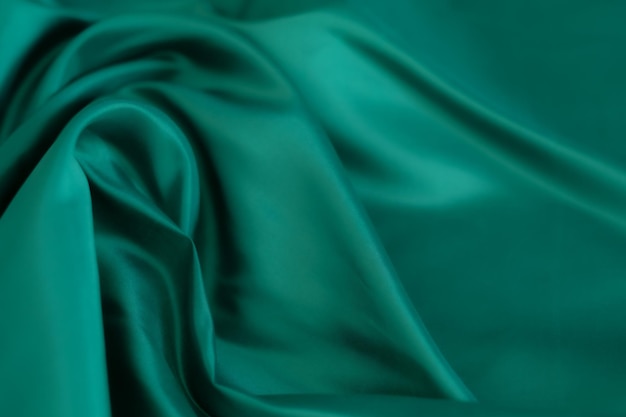 Soft focus of green fabric texture background abstract closeup texture of clothxA