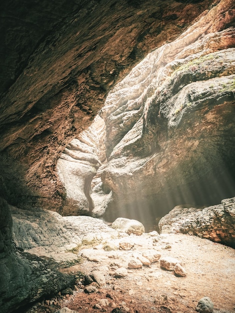 Soft focus. Saltinskij gorge with sunlight in Dagestan. Vertical view.