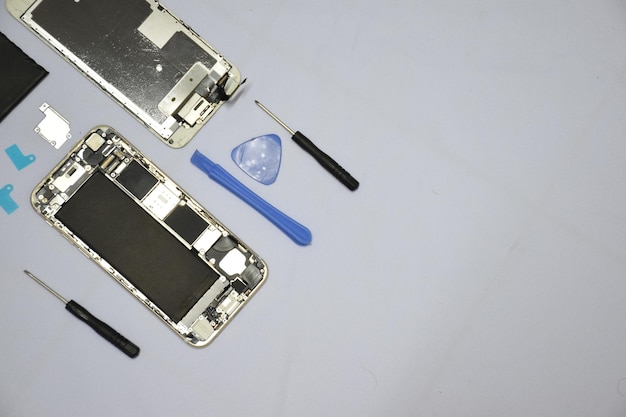 Soft focus to Tools for repairing smart phones on a white background