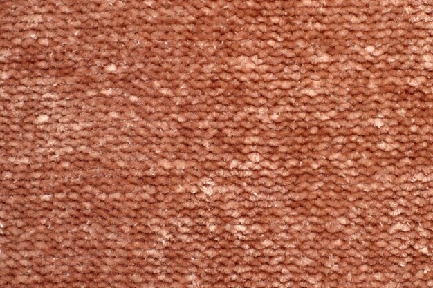 Soft light natural texture of knitted wool textile material background Brown crochet cotton fabric woven canvas